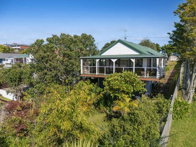 Water Views + Potential = This Will Sell!