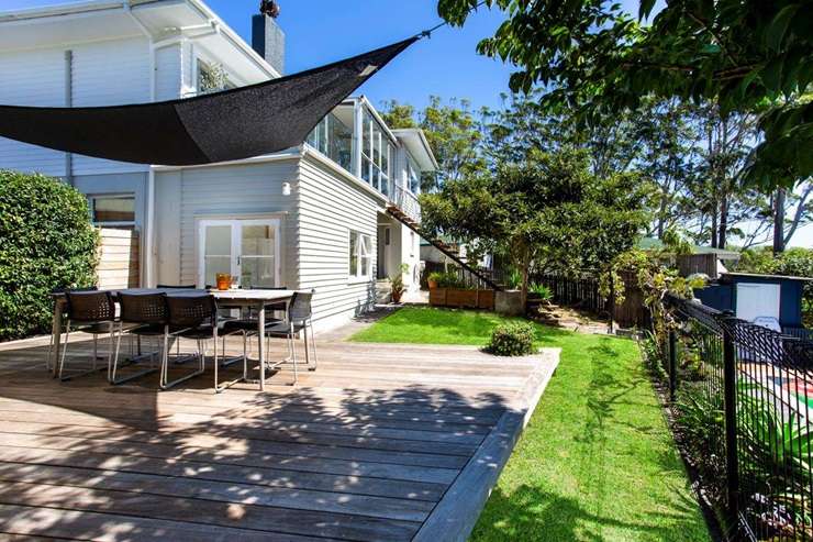A traditional Kiwi bach by the sea. It's clear from the agents OneRoof talked to that waterviews and sand rate highly with them and their buyers. Photo / Getty Images