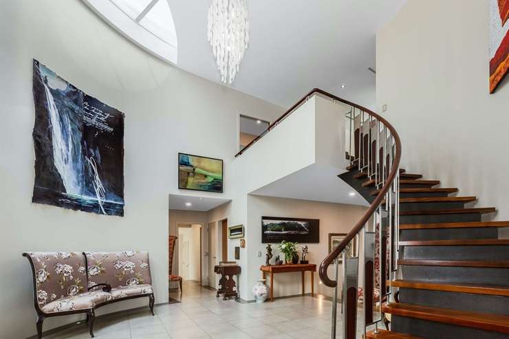 John and Rosa O’Sullivan have listed their six-bedroom home on the Kapiti Coast after deciding to downsize. Photo / Supplied