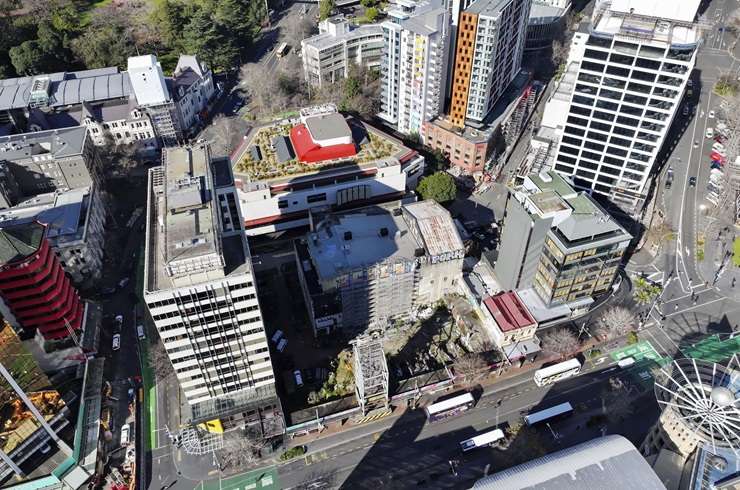 The 1638sqm site on Auckland's Queen Street lies behind wooden hoardings and will be familiar to Auckland commuters. Photo / Supplied