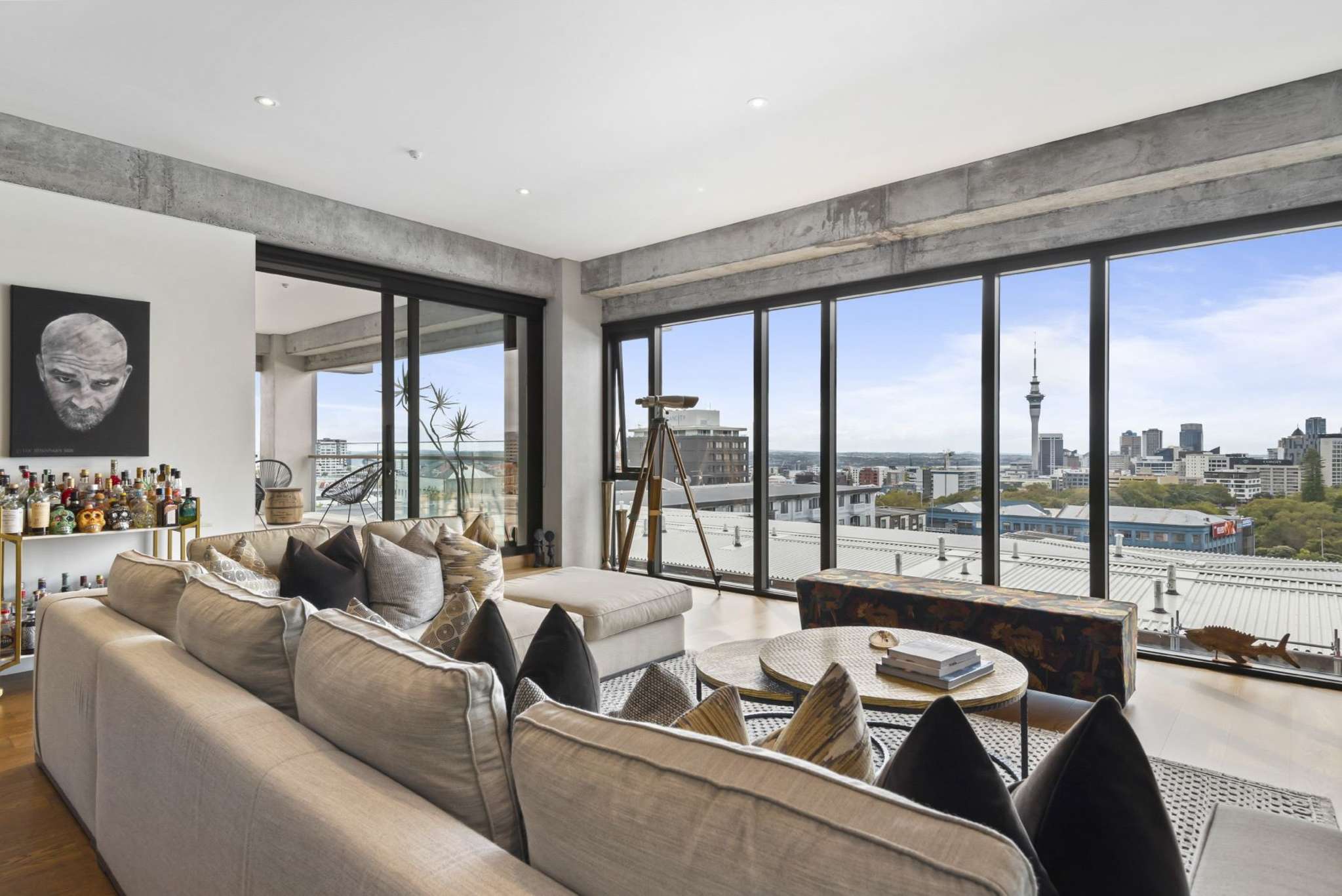 Real estate couple selling Auckland city pad