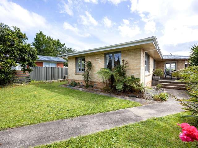 Three bedroom, two bathroom, brick family home!