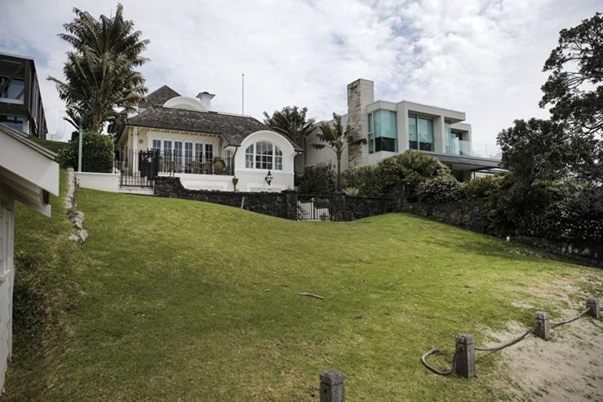 ‘Bittersweet’: Kiwi rich-lister sells neighbouring mansions for over $28m