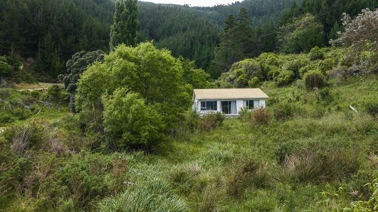 Waikakaramea Bay (pictured) and Deep Bay on Arapaoa Island, in Marlborough Sounds, are for sale with a combined asking price of $3m plus. Photo / Supplied