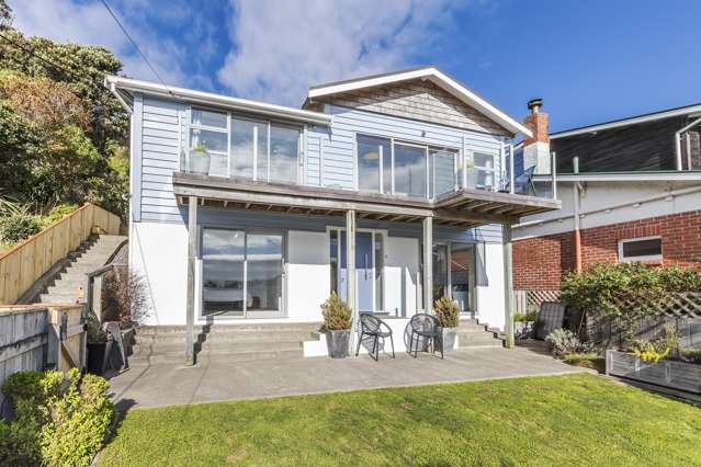 RENOVATED, ELEVATED, SUNFILLED & GORGEOUS