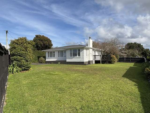 Renovated home with garage and big flat lawn