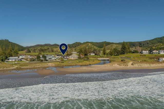 Classic Opito Bay bach – beachfront location