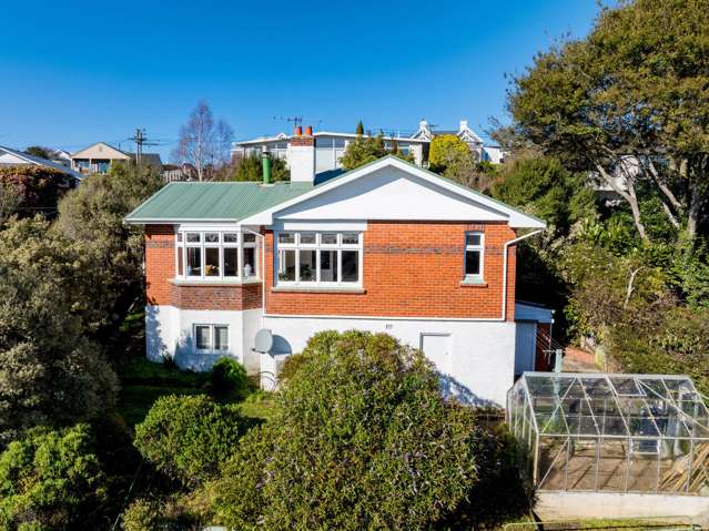 Sunny brick charmer with views and location