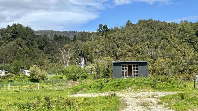 SUSTAINABLE LIVING WITH A WATERFALL VIEW!