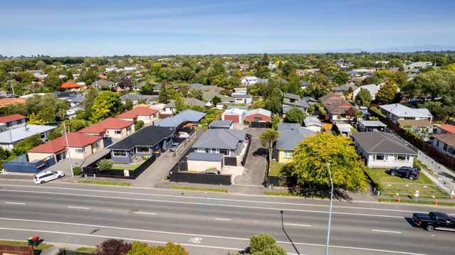 Five Car Garaging + Self Contained Studio!