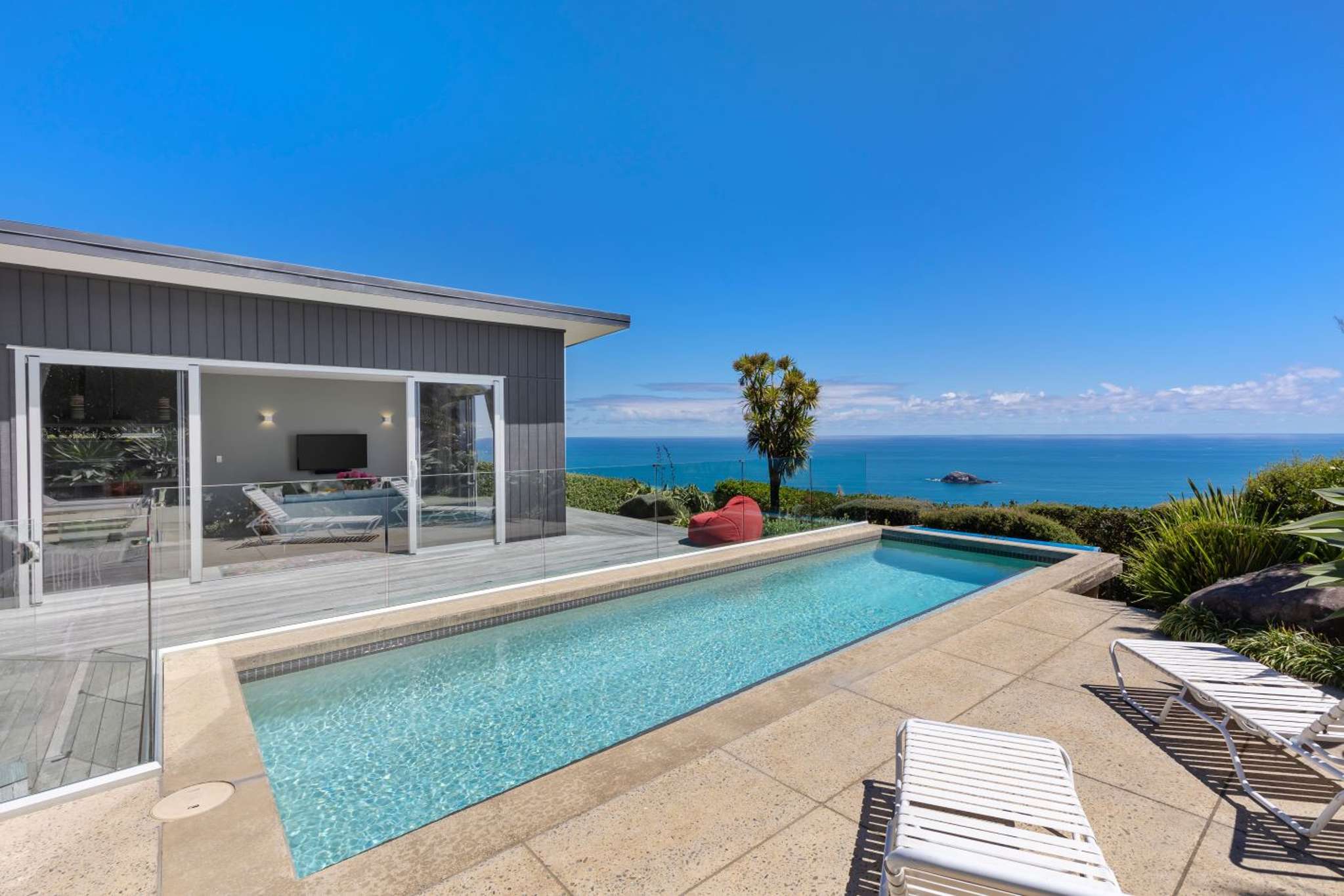 Couple reluctantly selling coastal home to move to Australia