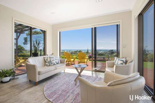 Elevated Coastal Retreat with Breathtaking Views