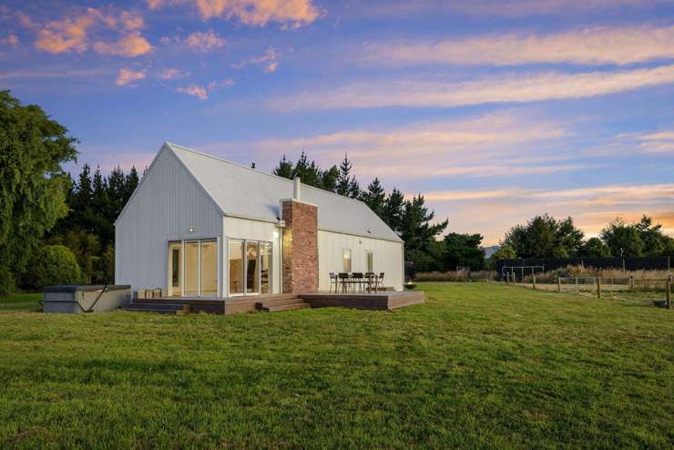 Bidding on this four-bedroom home on Mount Pleasant Road, Mount Pleasant, Christchurch, started at $750,000 and ended in a sale at <img.11m. Photo / Supplied