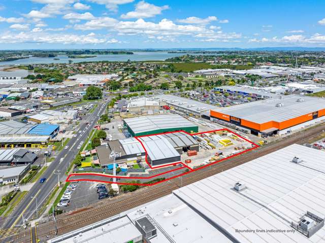 BUSINESS - TOWN CENTRE SITE LEASED TO MITRE 10