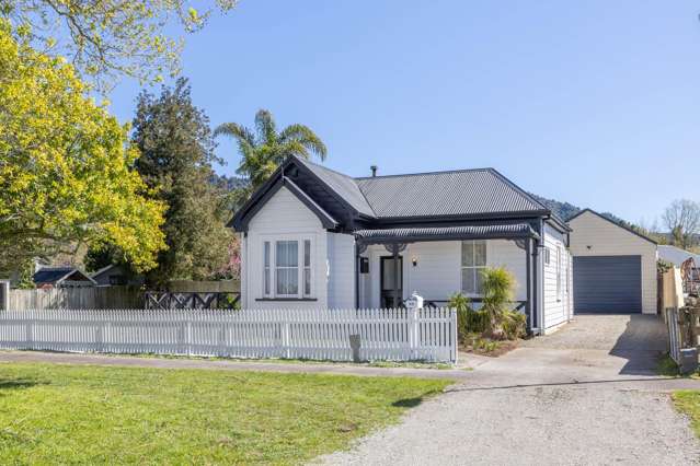 A Classic Villa with a Shed Full of Possibilities!