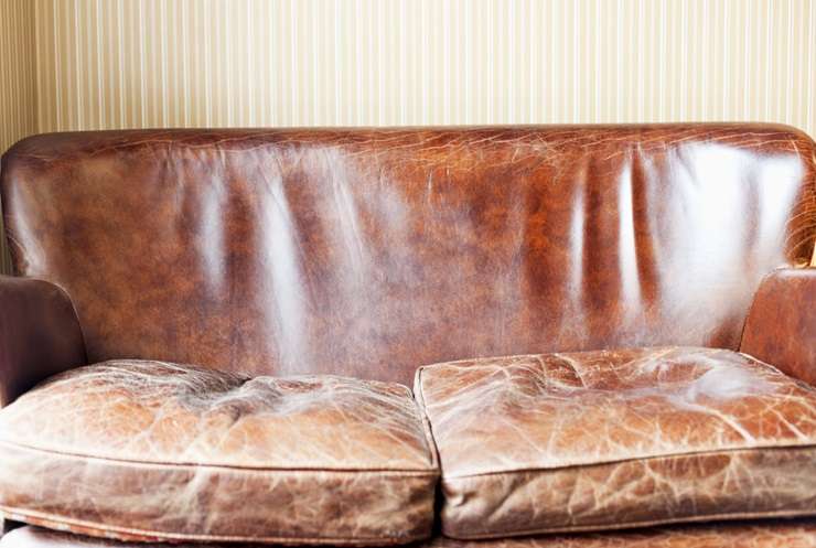 Home stager Janine King, of Janine King Design, with her secret weapons: cushions. Photo / Supplied