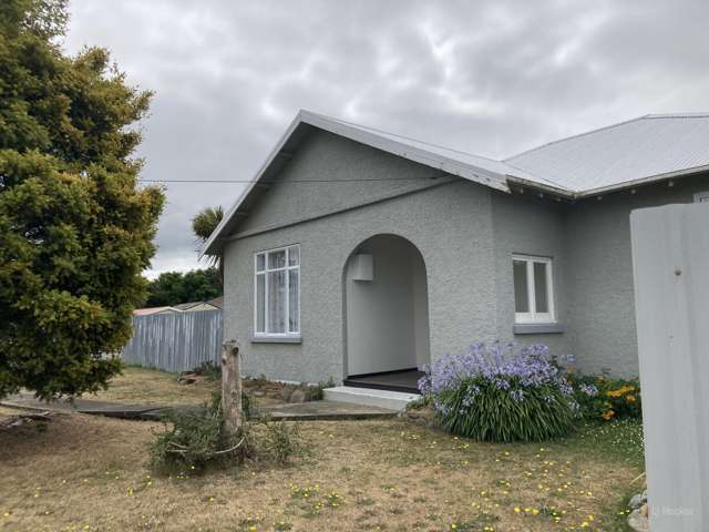 3-Bedroom Home with Carport