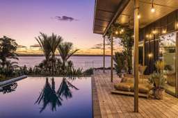 'Off the hook': Waterfront gem sparks US interest as buyers chase $7m-plus prize in celebrity suburb