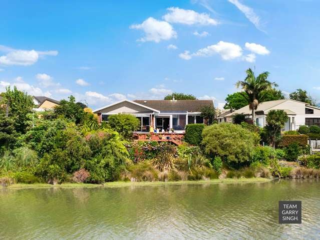 WATERFRONT STUNNER - MUST DOWNSIZE!