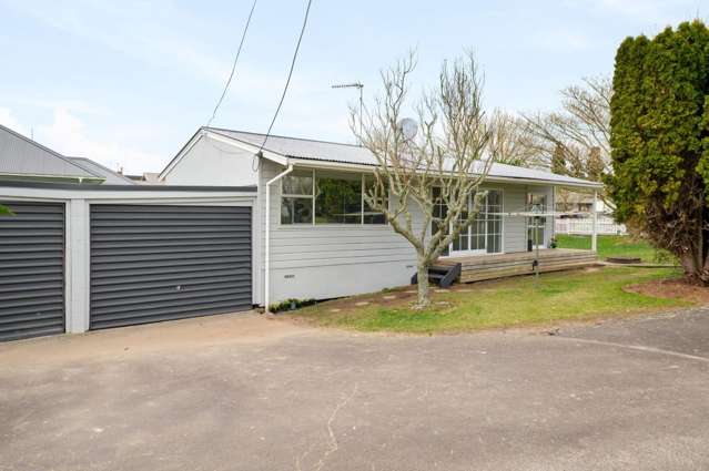 Spacious Street-Front Home with Added Potential
