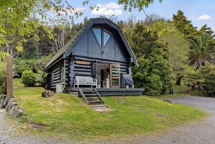 The Witch Hat houses are so iconic they even featured on a Pauanui postcard in the 1980s.  Photo / Supplied