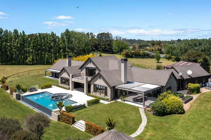 The luxury lodge in Coatesville, Auckland, which sold in November last year. In the top right corner of the photo is the $32.5m mansion that was once home to Kim Dotcom but is now owned by the founders of Zuru Toys. Photo / Supplied