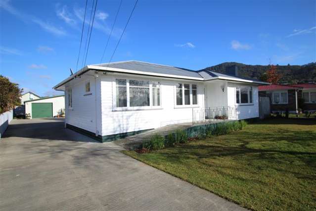 Tidy Three-Bedroom Home with Double Garage