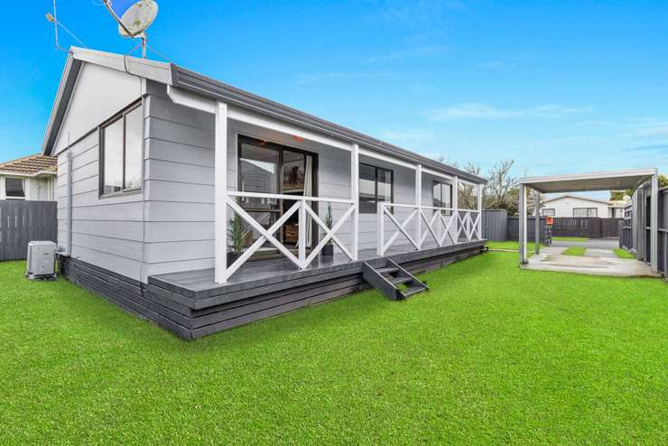 The two-bedroom cottage on Marshall Street, in Fairfield, Hamilton, was advertised as a do-up. Photo / Supplied