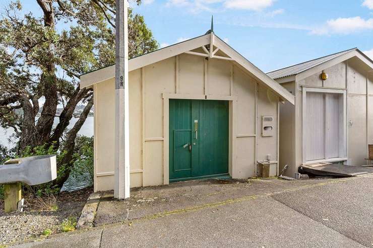 boatsheds on water with trees behind  Boatshed 20 1 Ngapipi Road, Orakei, Auckland on Hobson Bay