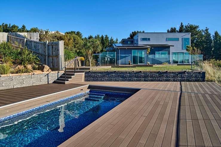 A four-bedroom luxury home is up for grabs for just over $2m at 22 Milford Street, in Aotea. Photo / Supplied