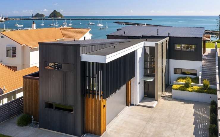 The architecturally-designed home has arguably the best views in New Plymouth. Photo / Supplied