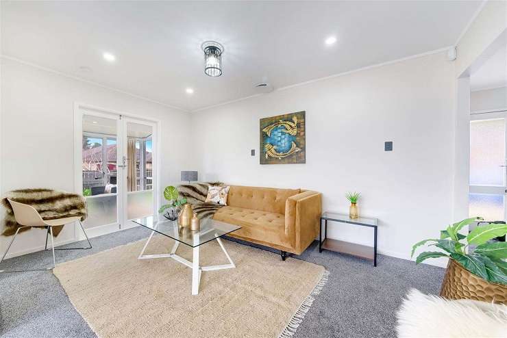 A renovated three-bedroom, one-bathroom home on O'Connell Street, in Manurewa, sold to first home buyers for $890,000. Photo / Supplied