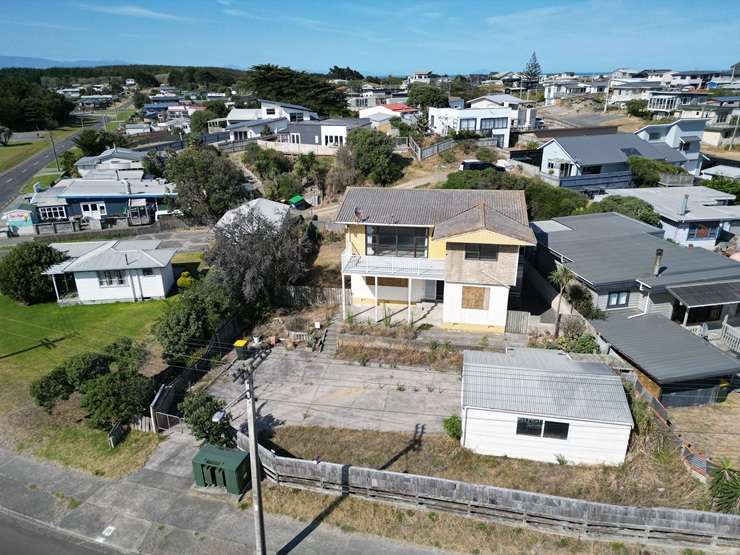 A former police property on Ocean Beach Road, in Foxton Beach, is on the market for sale. Photo / Supplied