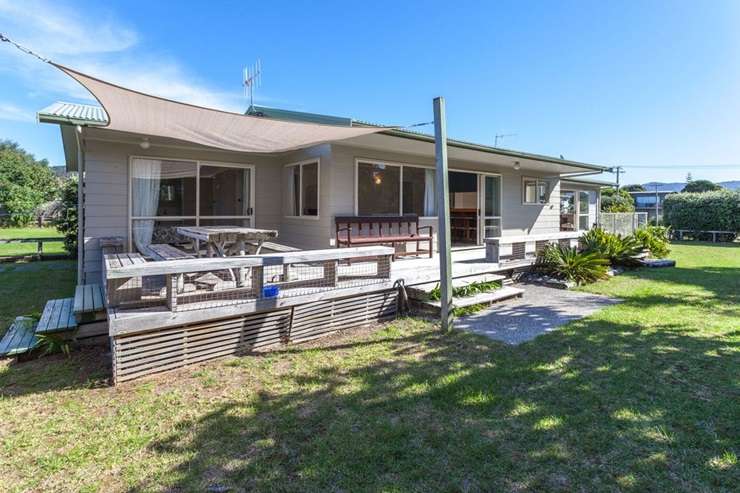 Ray White agent Jayne Kiely is taking her bach at 416 Rangi Avenue, in Whangamata, to auction. Photo / Supplied