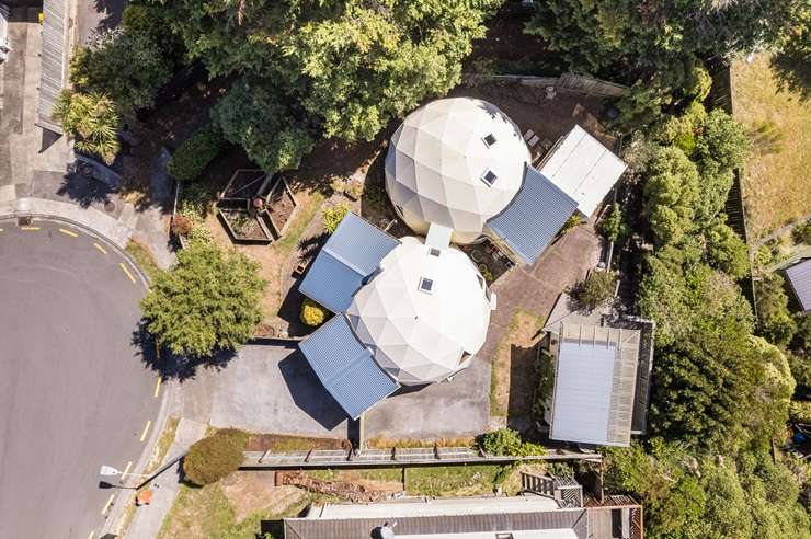 The double dome house at 14 Tremaine Place, in Cambourne in Porirua, is inviting buyer enquiry over $690,000. Photo / Supplied