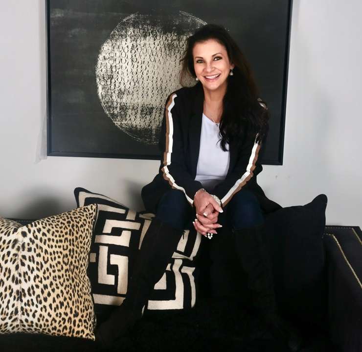 Some well-chosen cushions and rugs can often be the most cost-effective way to transform a lounge or bedroom. Artwork / Beth Walsh