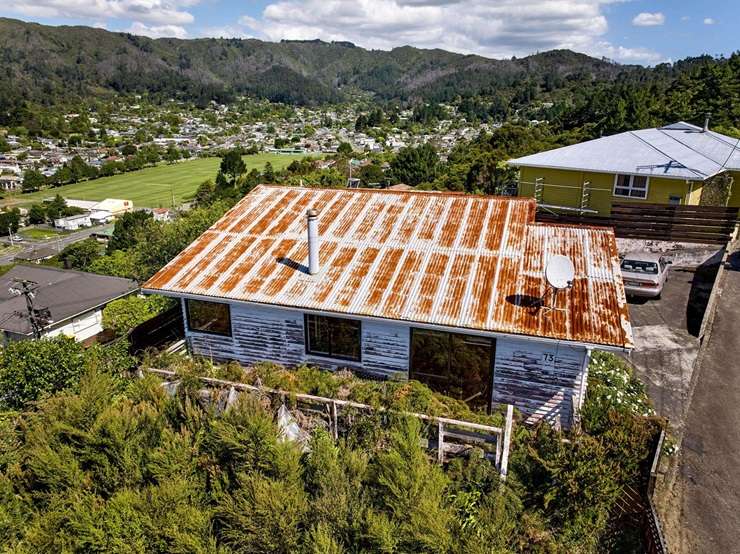 The weatherboard home on Logie Street, in Wellington's Stokes Valley, goes to auction with expectations it will sell below RV. Photo / Supplied