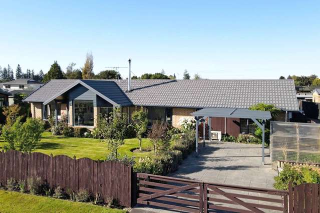 Come Home to Luxury on Racecourse Avenue!