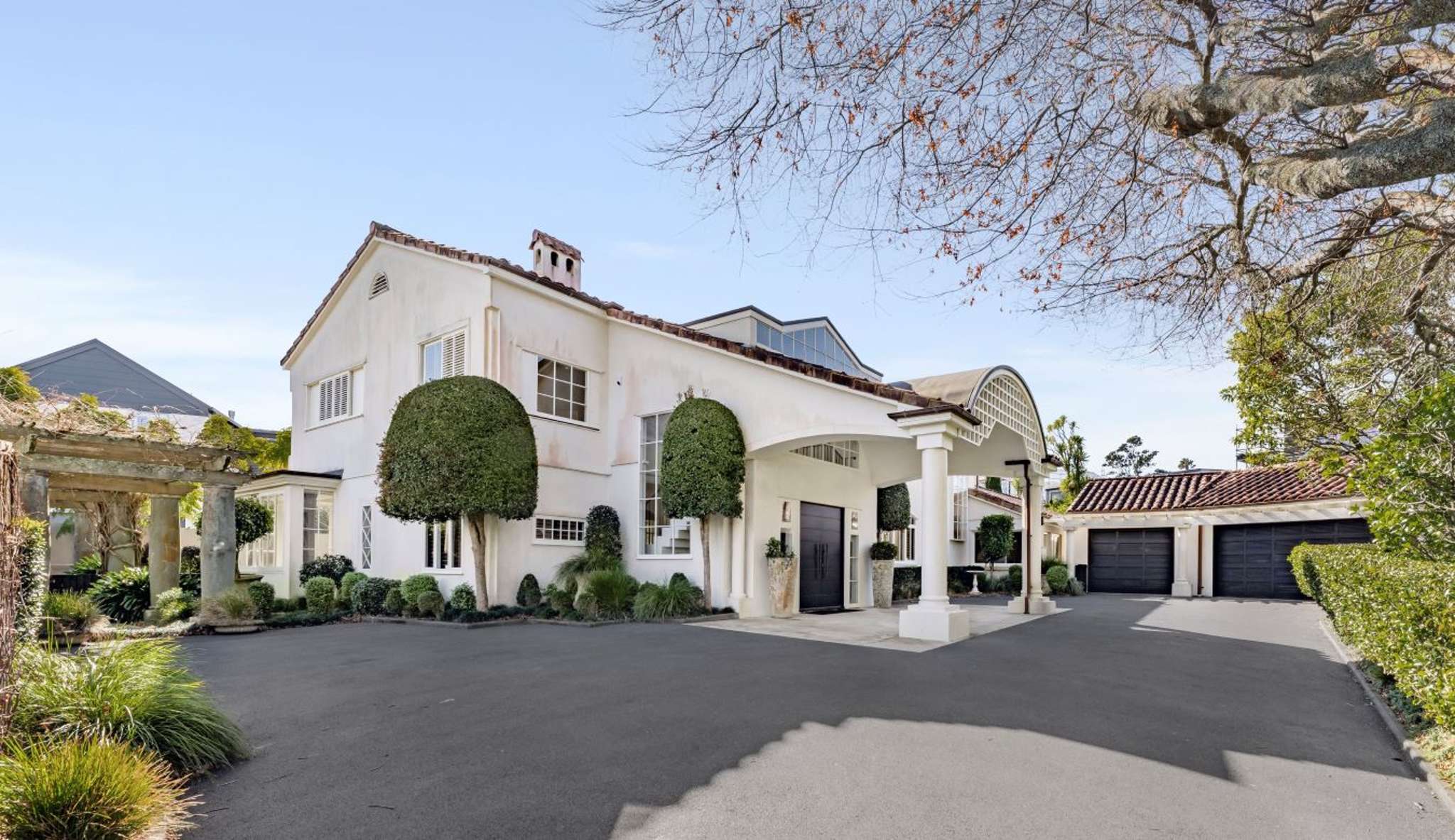 ‘If we could move it across Auckland’: Family selling stucco-style home for school, sports