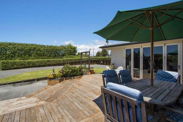 Stylish Home with Four-Bay Shed