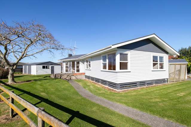 Solid, Sunny & Packed with Garage Space