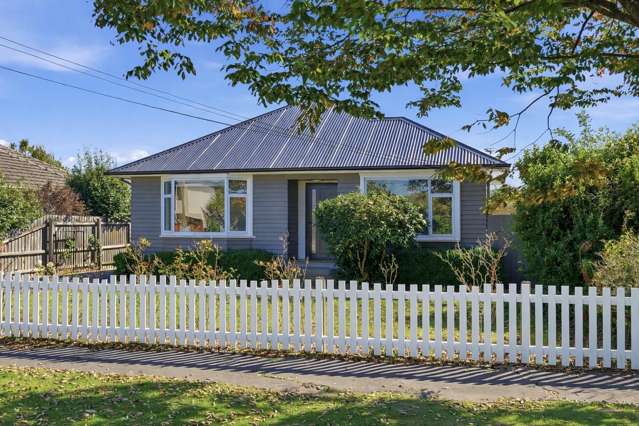 White Picket Charm Meets Modern Comfort