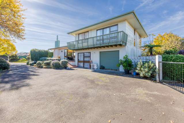 Your new happy place! Hilltop home with potential