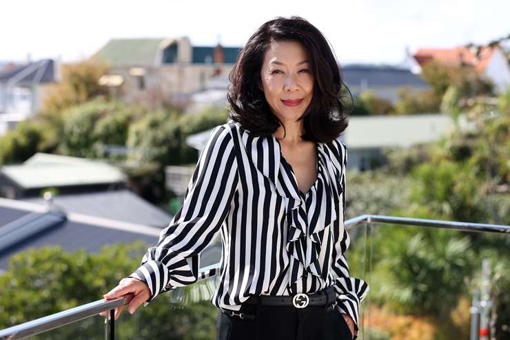 A family toughed it out over 220 bids to buy a plaster-clad home in Auckland's double grammar zone, on Brookland Place, in Remuera. Photo / Supplied