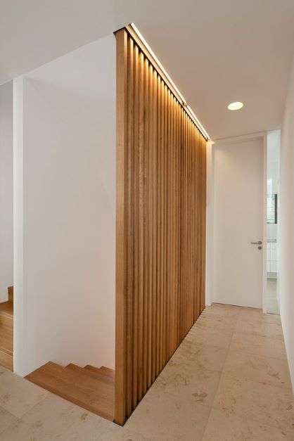 wooden staircase balustrade with vertical slat battens