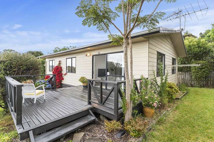 Up for grabs and already attracting buyer attention is a four-bedroom home at 2/37 Nile Road, in Milford, Auckland. Photo / Supplied