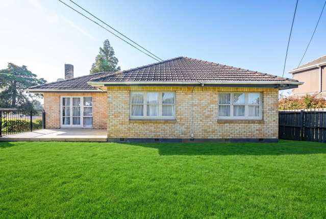 Timeless 4 Bedroom Brick Home