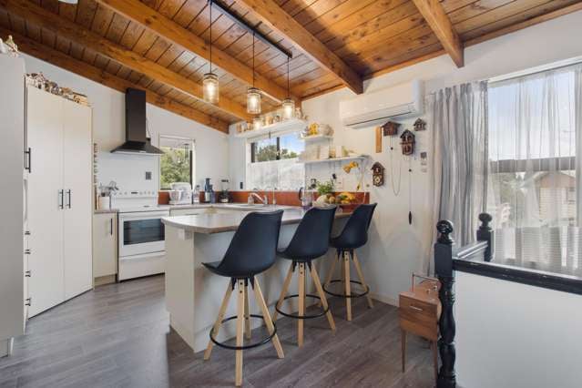 Solid Brick, Sunny Outlook & a Short Walk to Town!