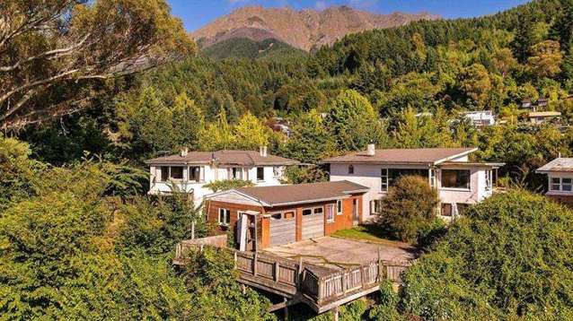 Buyers snap up French couple’s ‘rumpty’ Queenstown houses for just over $8m