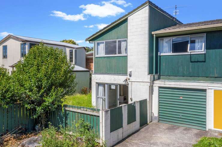 Competition in the auction room for this four-bedroom Auckland villa, formerly known as Kerr House, was fierce. Photo / Supplied